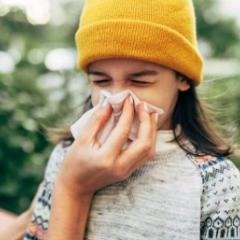 Child blowing nose